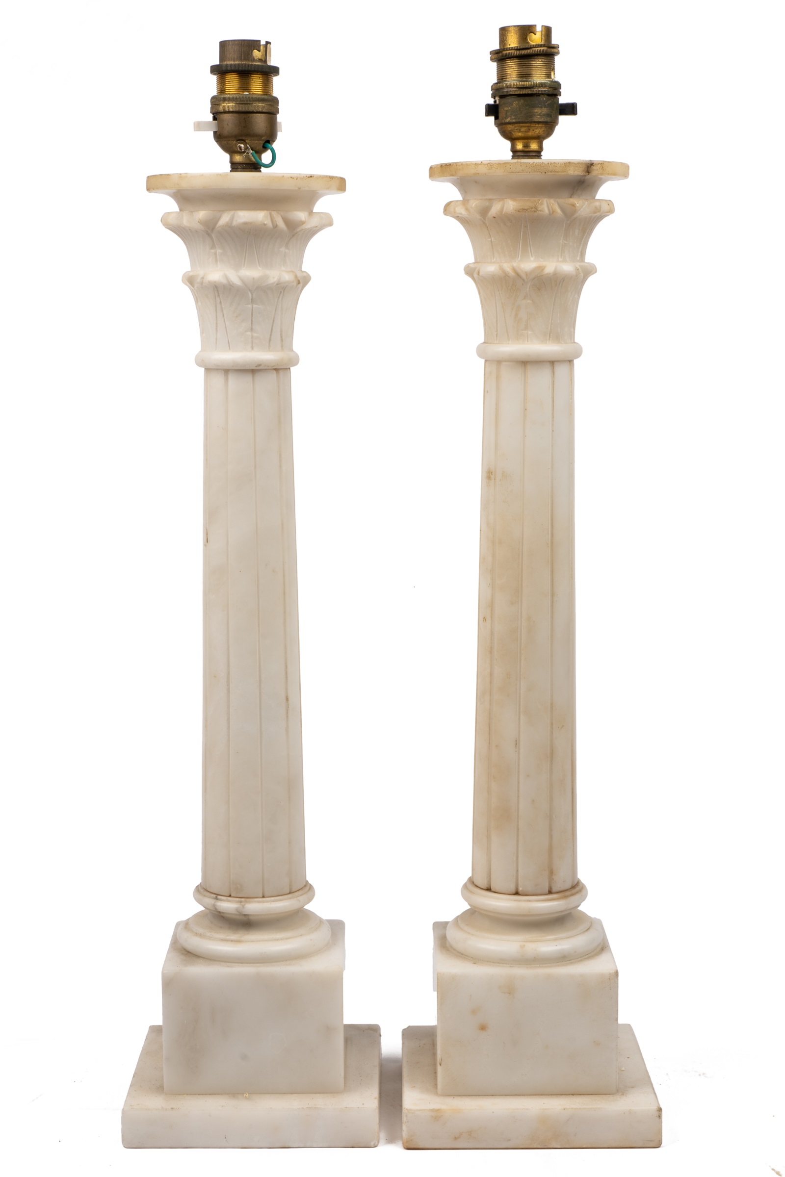 A pair of alabaster table lamps