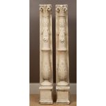 A pair of carved stone chimneypiece support pilasters