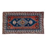 A 20th century hand-woven Turkish Seccade rug