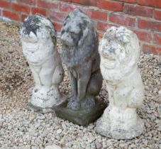 Three cast stone lions