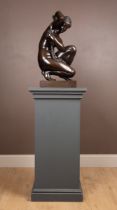 In the manner of Antonio Susini, a bronze statue of the crouching Venus