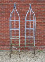 A pair of galvanised wrought iron rose obelisks