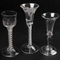 Two 18th century wine or cordial glasses and a further glass