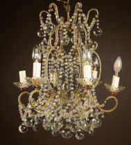 A Regency style glass six-branch chandelier