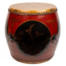 An red and black lacquered temple drum