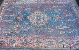 A large 20th century hand-woven Persian Heriz style Carpet