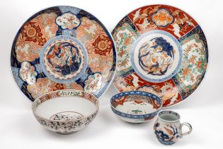 Two similar Imari chargers together with three further items of Imari porcelain