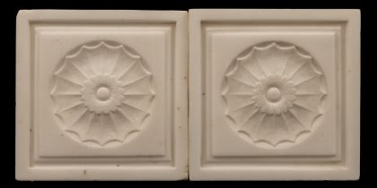 A pair of marble roundels