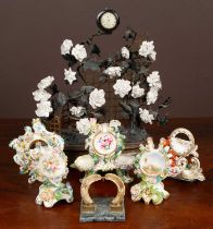 A collection of 19th century porcelain watch stands