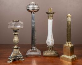 A collection of four lamps