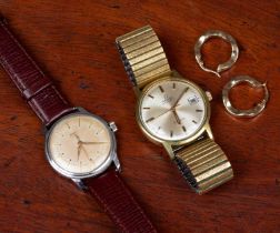 Two watches and a set of earrings