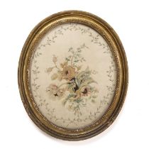 A late 18th-century silk embroidered oval panel