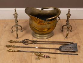 A collection of fireside brass