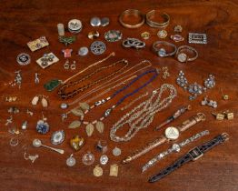 A collection of costume jewellery and watches