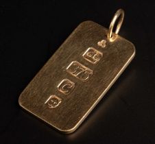 A 9ct. gold ingot