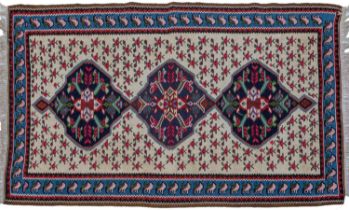 A Senneh Kelim rug together with a Tekke Turkmen prayer mat