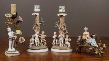 A collection of porcelain to include a pair of figural candlesticks by Bohne Sohne