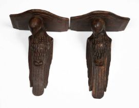 A pair of carved Indian style hardwood wall brackets