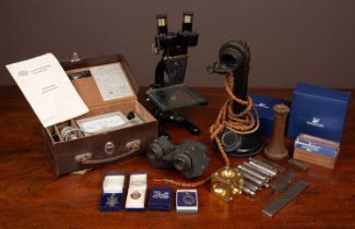 A collection of visual equipment and other miscellaneous items