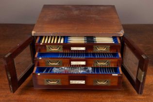 Silver and plate in a mahogany canteen