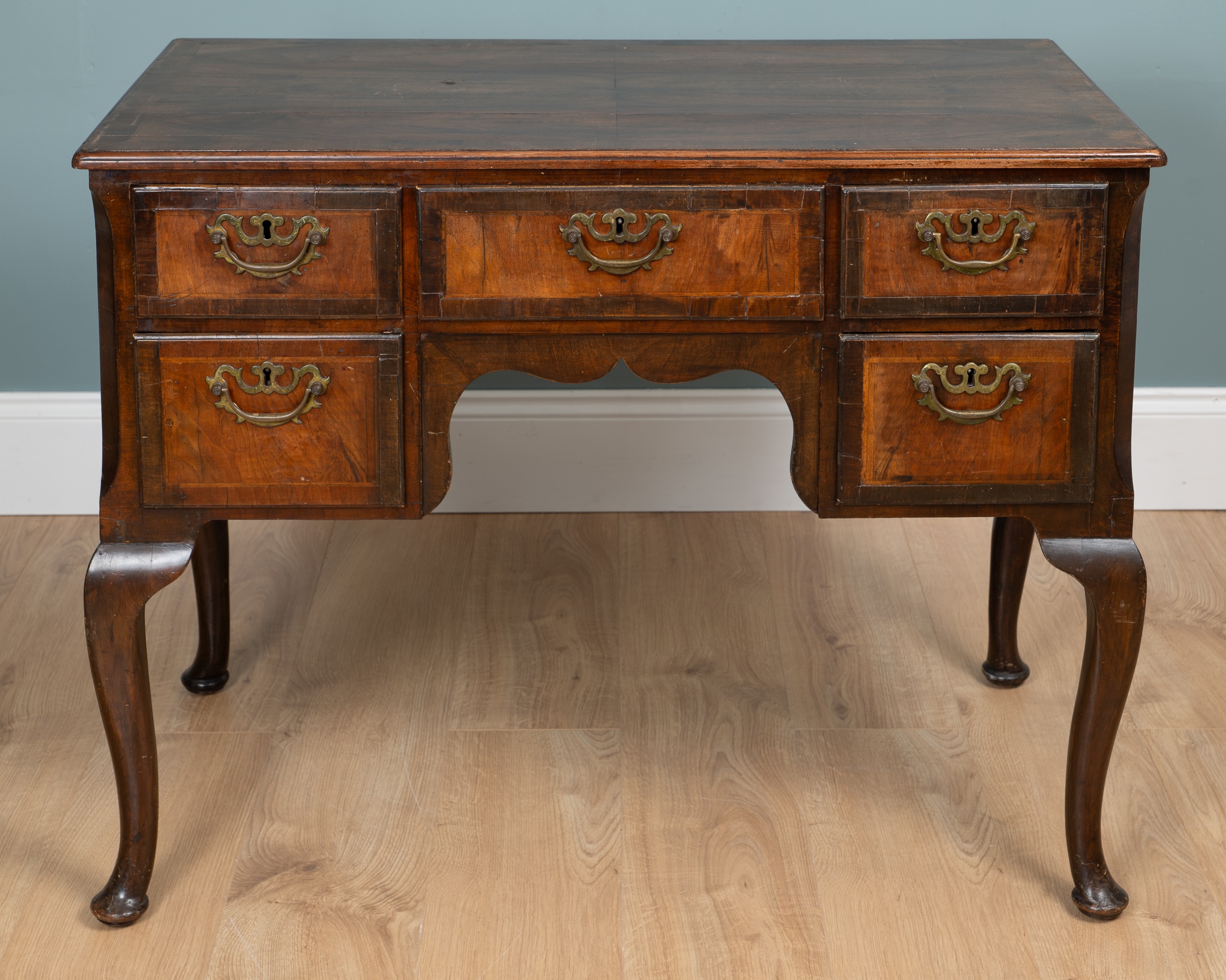 A Georgian mahogany lowboy