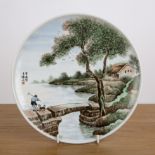 Porcelain painted plate Chinese, Republic period painted with a farmer and a dog crossing a river on