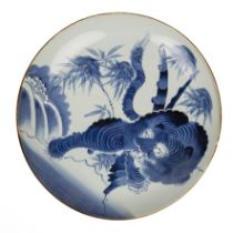 Blue and white porcelain charger Chinese, 18th Century painted with qilin and bamboo, 32.7cm