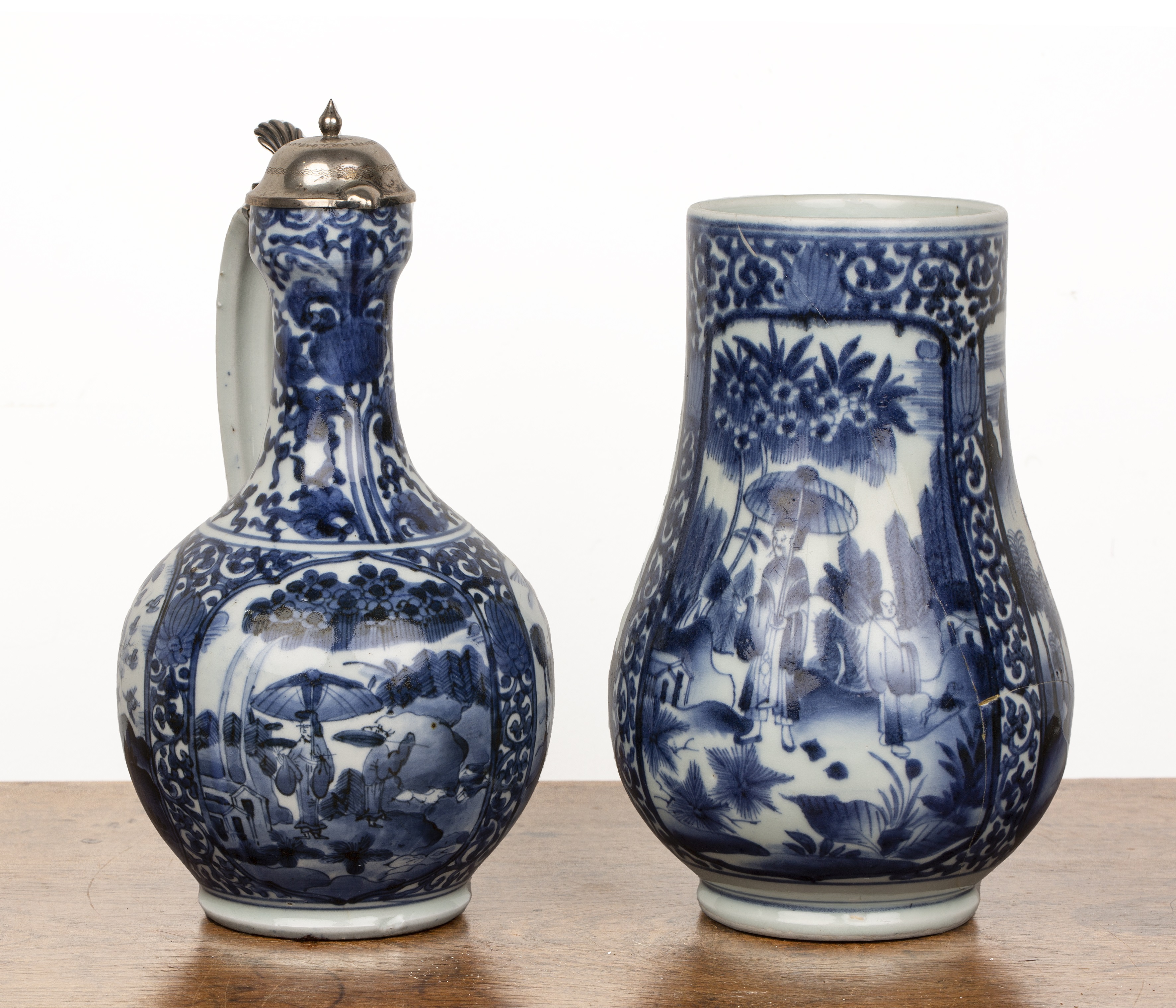 Blue and white porcelain Arita and a tankard Japanese, circa 1700 both with panels of landscape