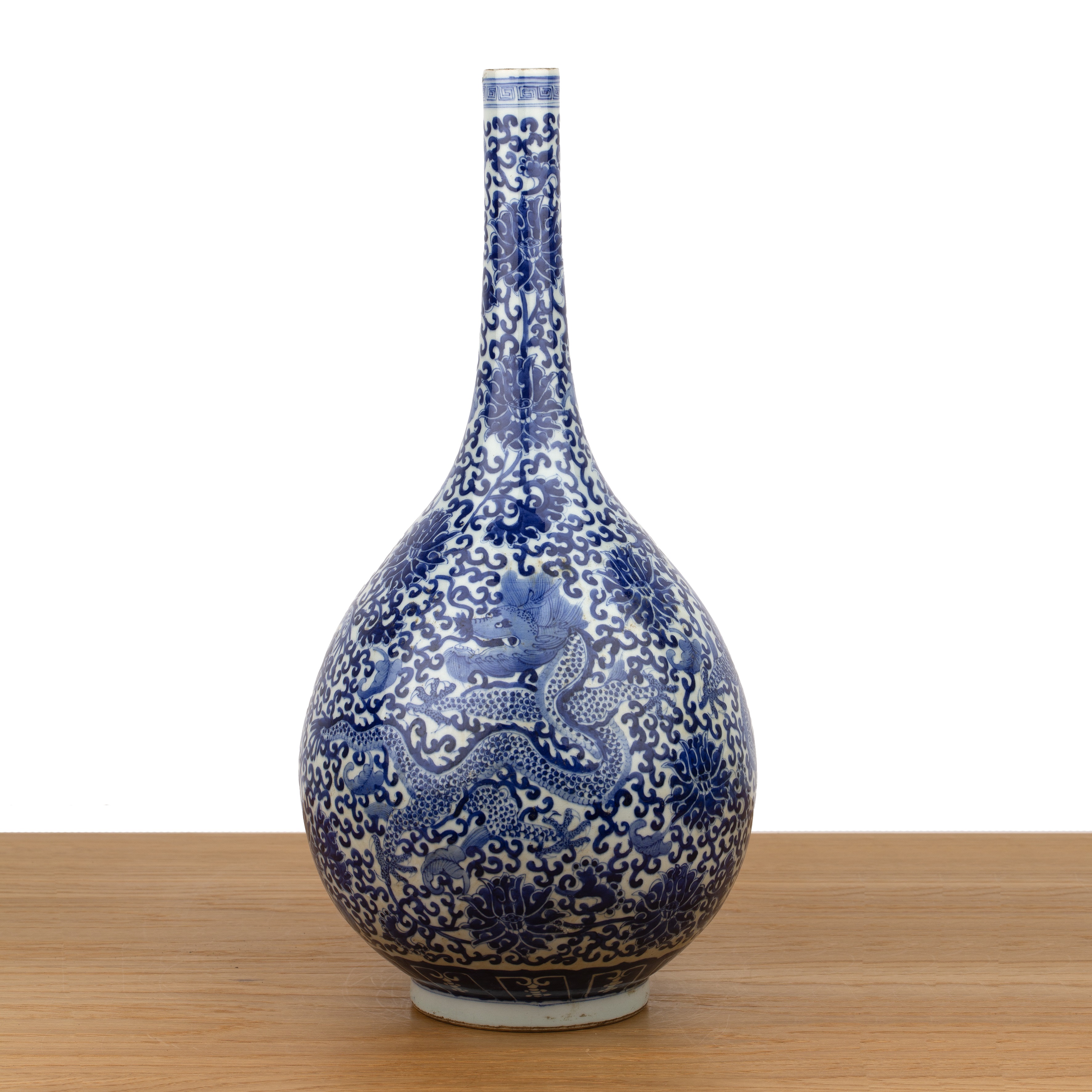Blue and white porcelain bottle vase Chinese, early 20th Century painted with trailing dragons and