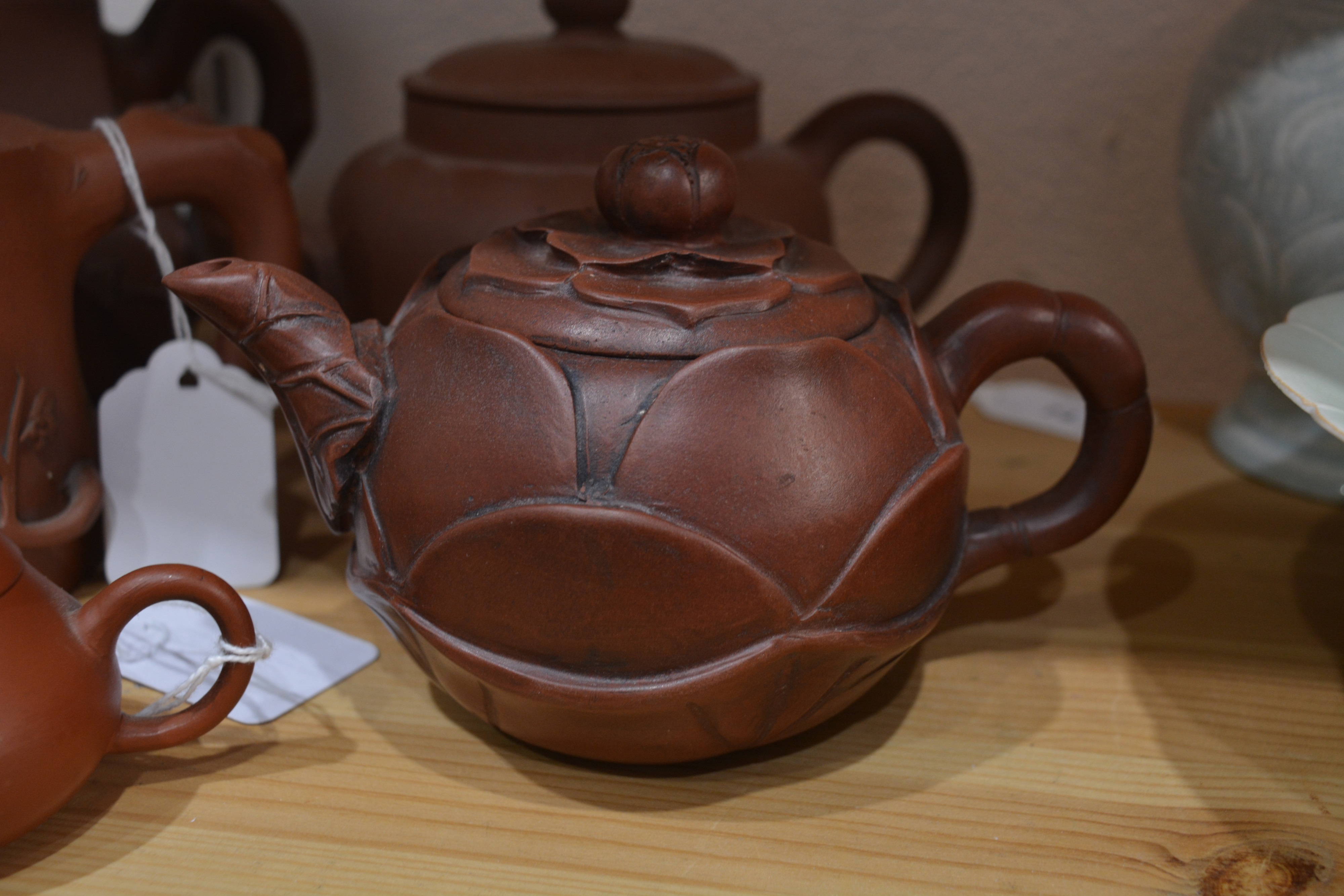 Group of five Yixing teapots Chinese, 19th/20th Century to include a rectangular teapot with moulded - Image 9 of 13