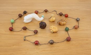 Group of pieces Chinese and Japanese including a necklace with hardstone, lacquer, carved nut, white