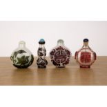 Four Peking glass snuff bottles Chinese including an opaque bottle with birds, a white opaque bottle