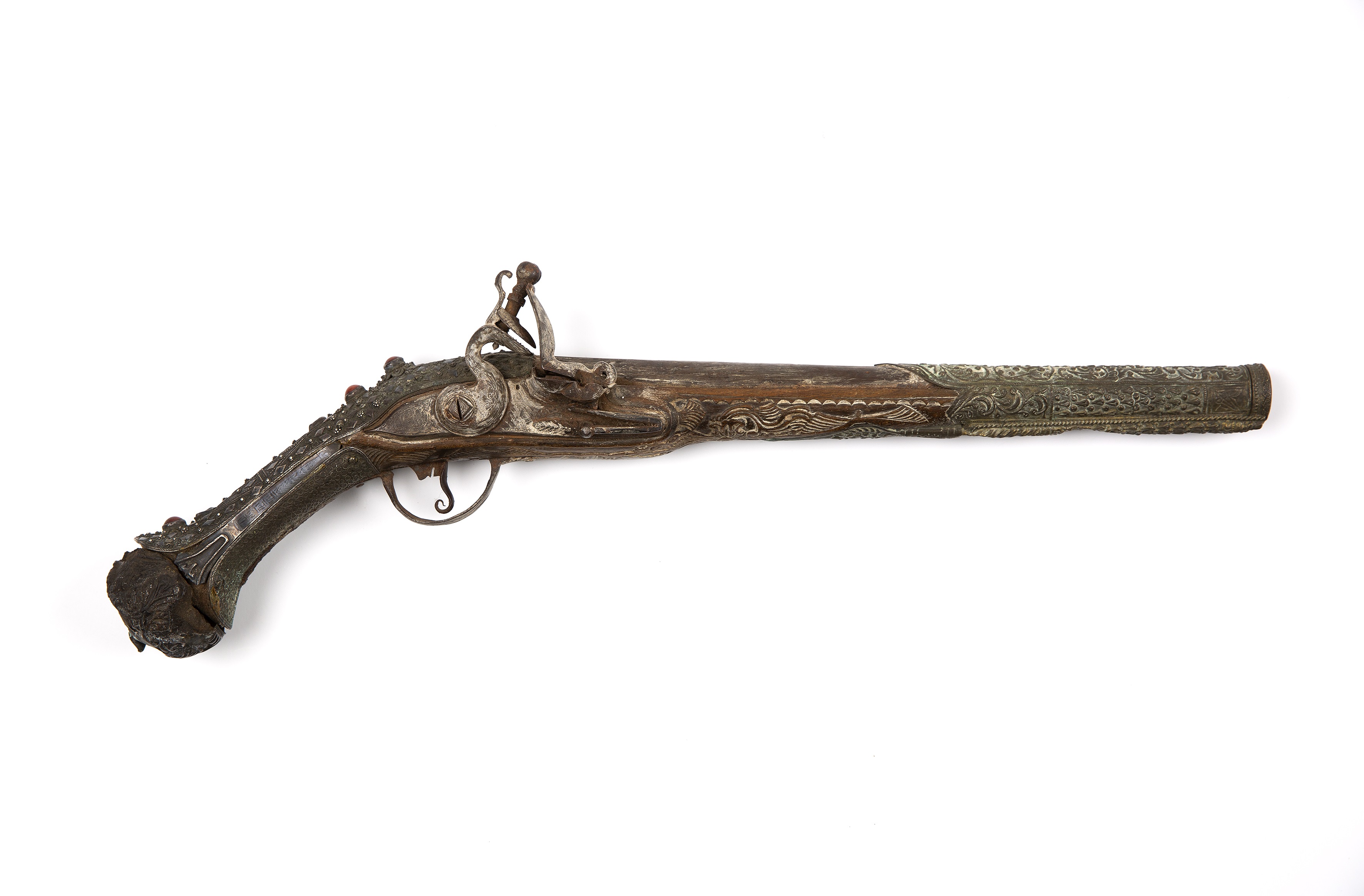 Flintlock pistol Turkish, 19th Century with brass mounts, decorated with a scrolling foliage-style