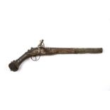 Flintlock pistol Turkish, 19th Century with brass mounts, decorated with a scrolling foliage-style