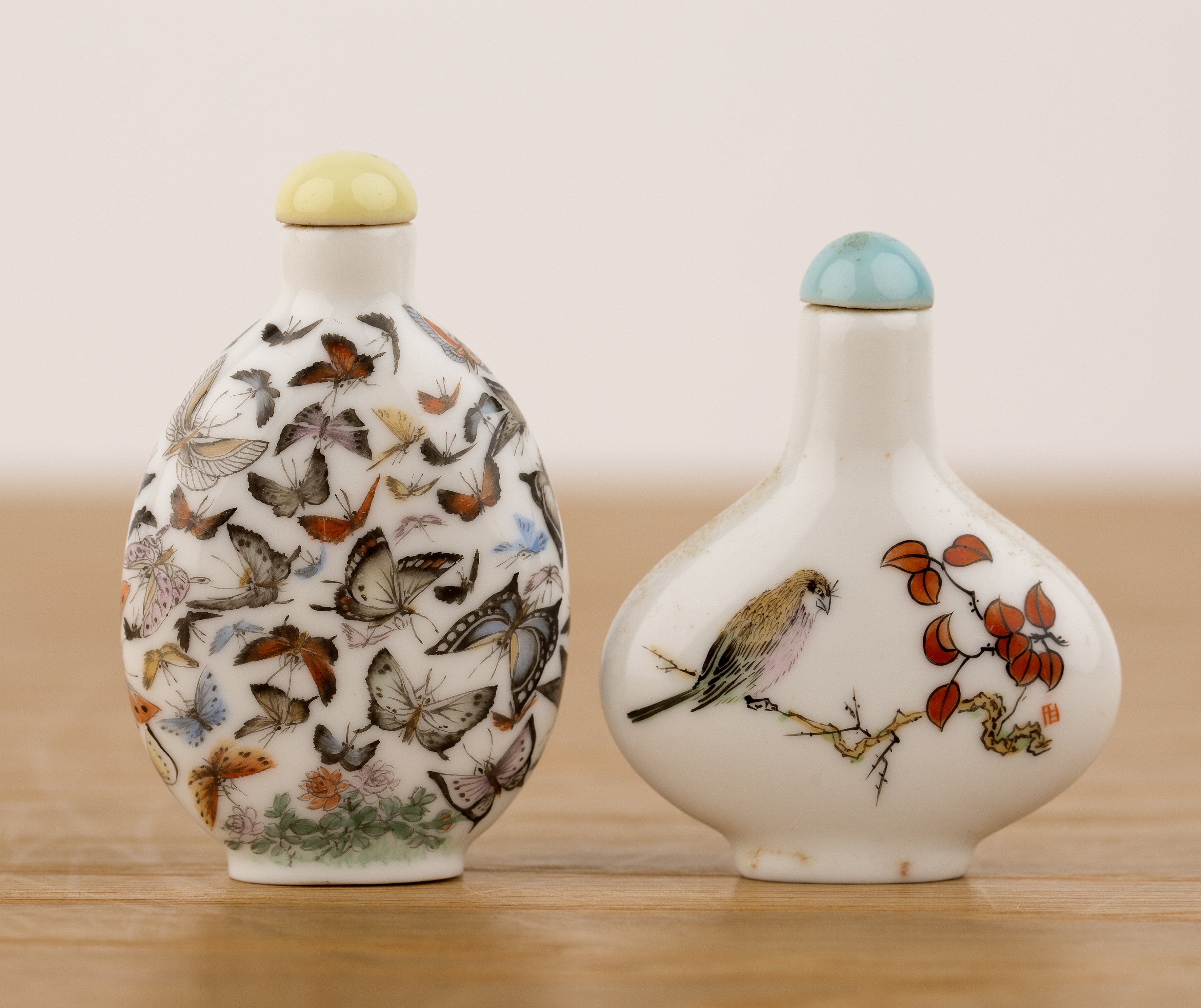 Two porcelain snuff bottles Chinese, 20th Century painted with butterflies, signed and inscribed and - Image 2 of 3