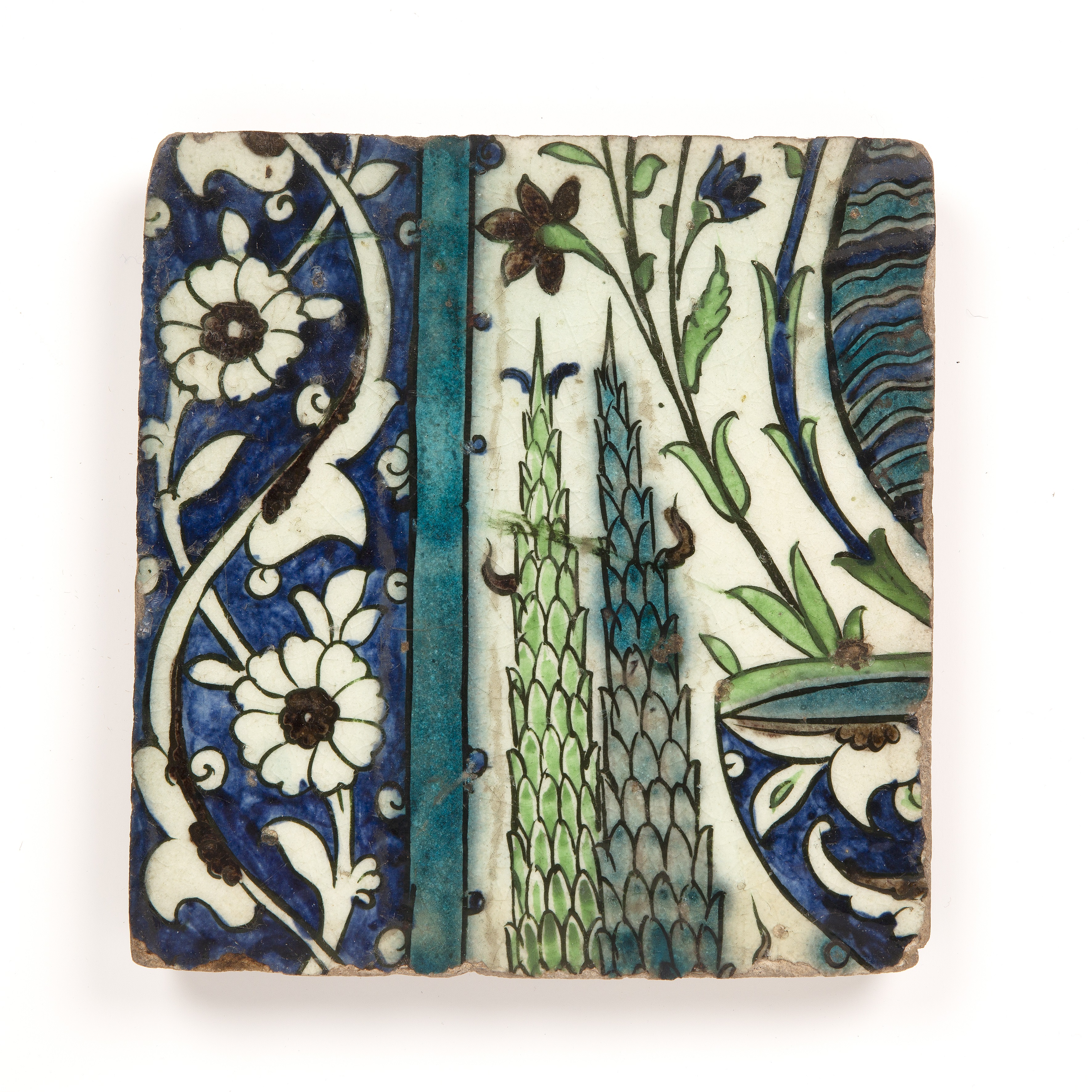 Iznik polychrome tile Turkey, mid-16th Century with leaf designs, in green, blue and turquoise, 21.