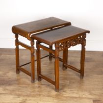 Hongmu nest of two small altar tables Chinese, 19th Century each with a carved frieze, 66cm wide x