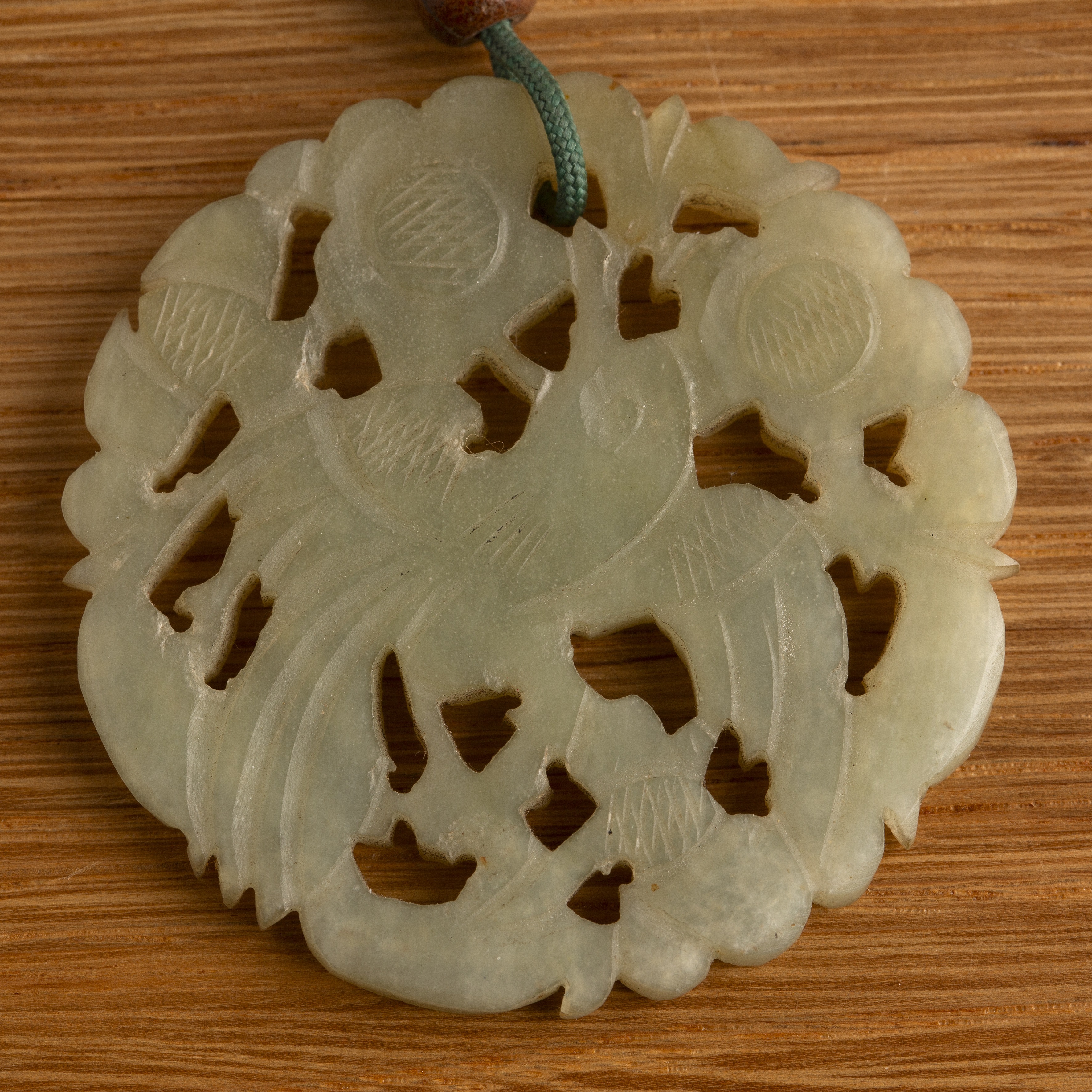 Cinnabar lacquer carved circular box and a jade pendant Chinese the pendant carved with a bird, - Image 3 of 5