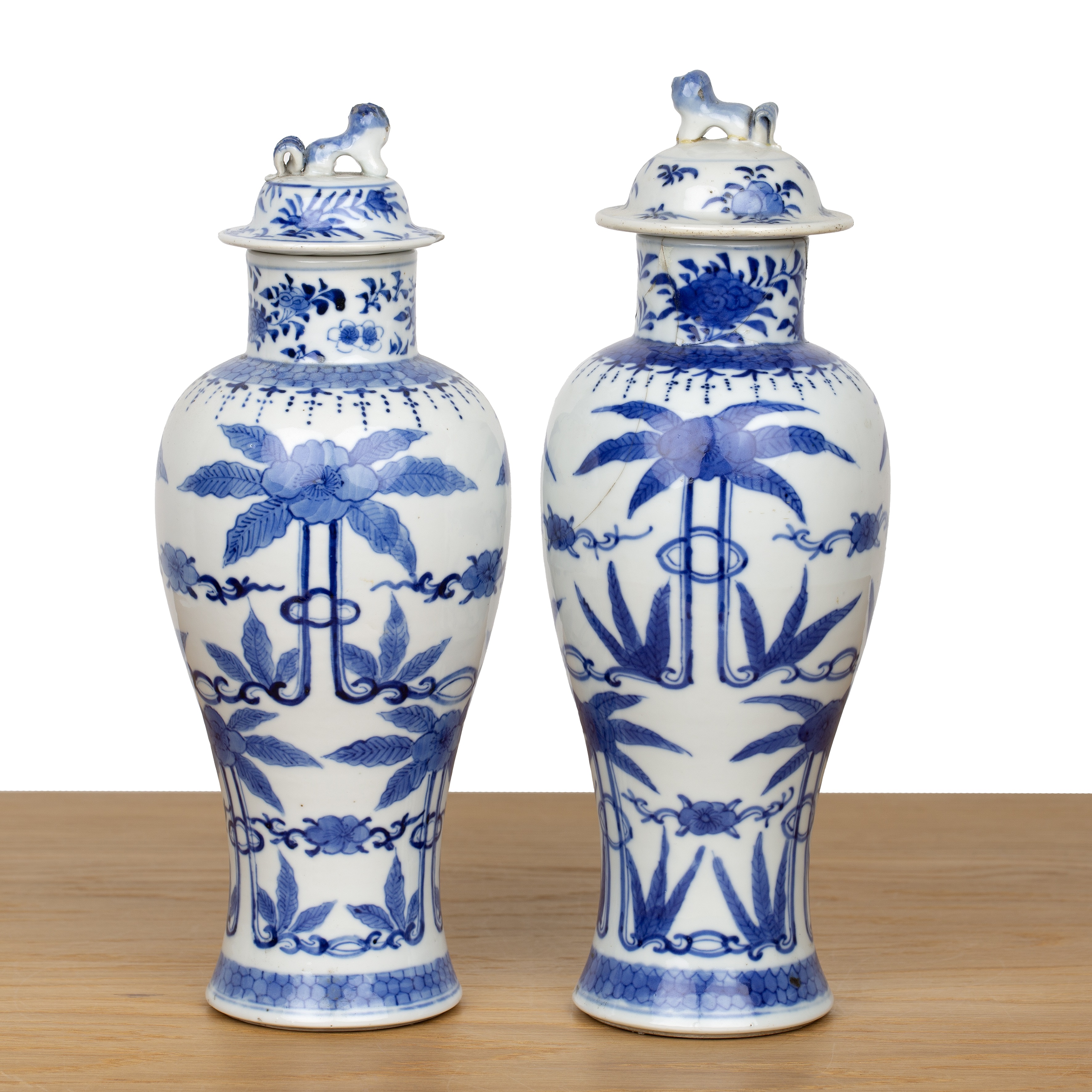 Two similar blue and white porcelain vases and covers Chinese, 19th Century painted with flower