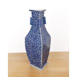 Triangular blue and white porcelain vase Chinese, 19th Century with raised cylindrical rings to