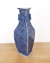 Triangular blue and white porcelain vase Chinese, 19th Century with raised cylindrical rings to