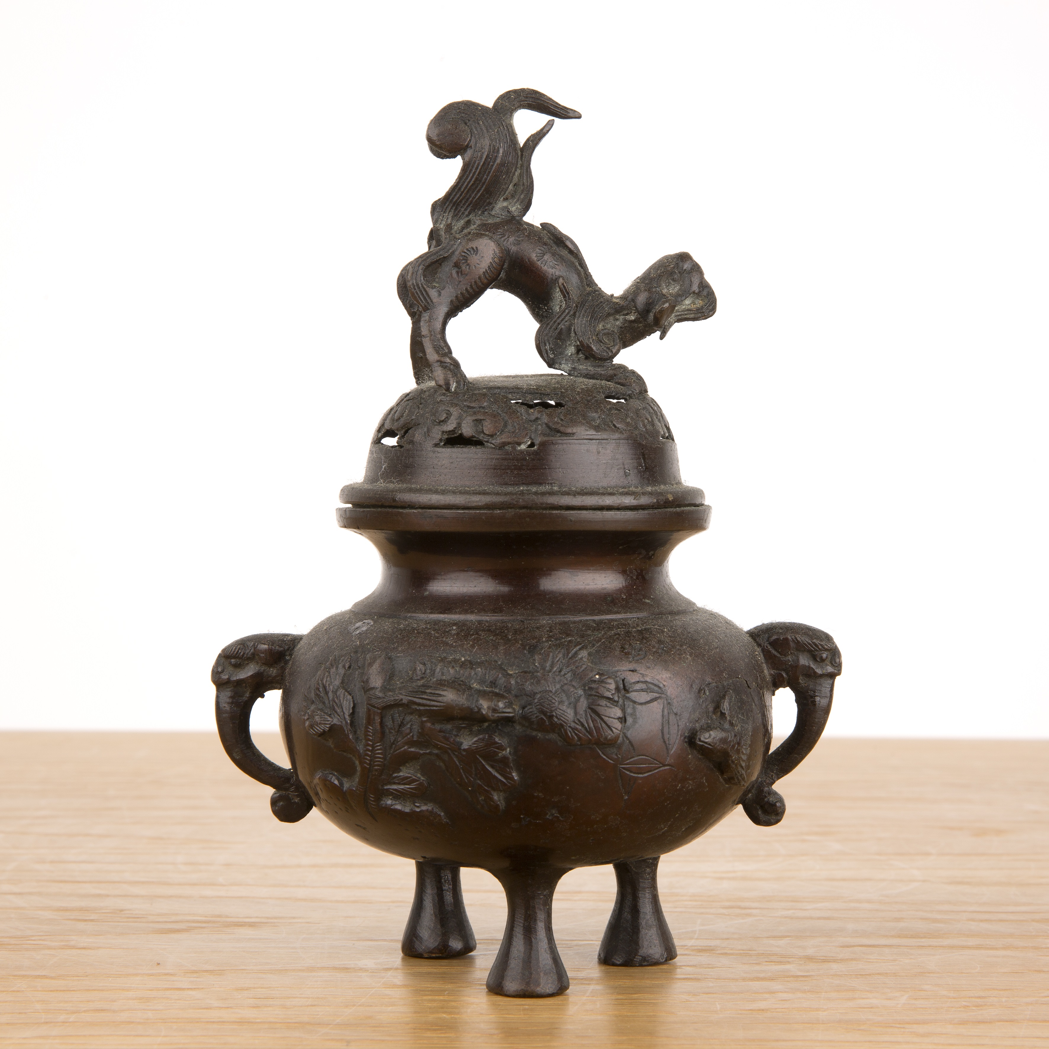 Small bronze censer Japanese with a kylin finial, 17cm high With some marks and wear.