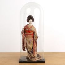 Doll under a glass dome Japanese the doll dressed in a kimono, the kimono with floral decoration