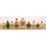 Group of nine Peking glass inside painted snuff bottles Chinese including a monochrome fish-