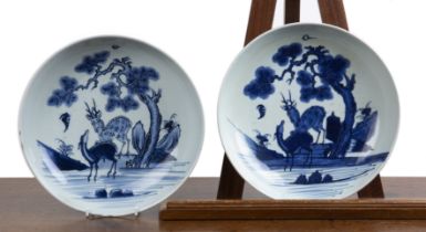 Pair of blue and white porcelain large dishes Chinese, 18th Century each painted with symbolic