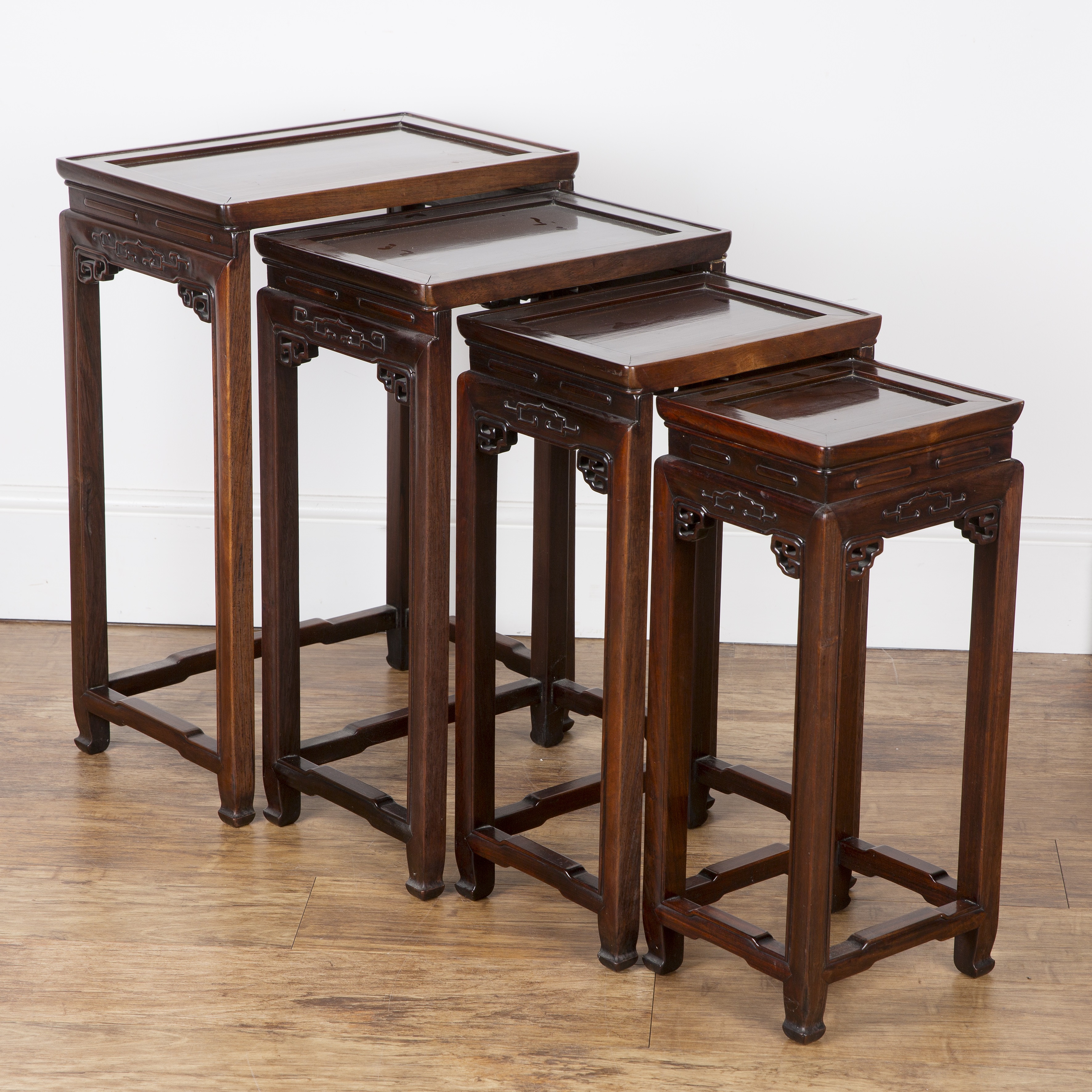 Hongmu quartetto of occasional tables Chinese, early 20th Century comprising of a Ming style smaller