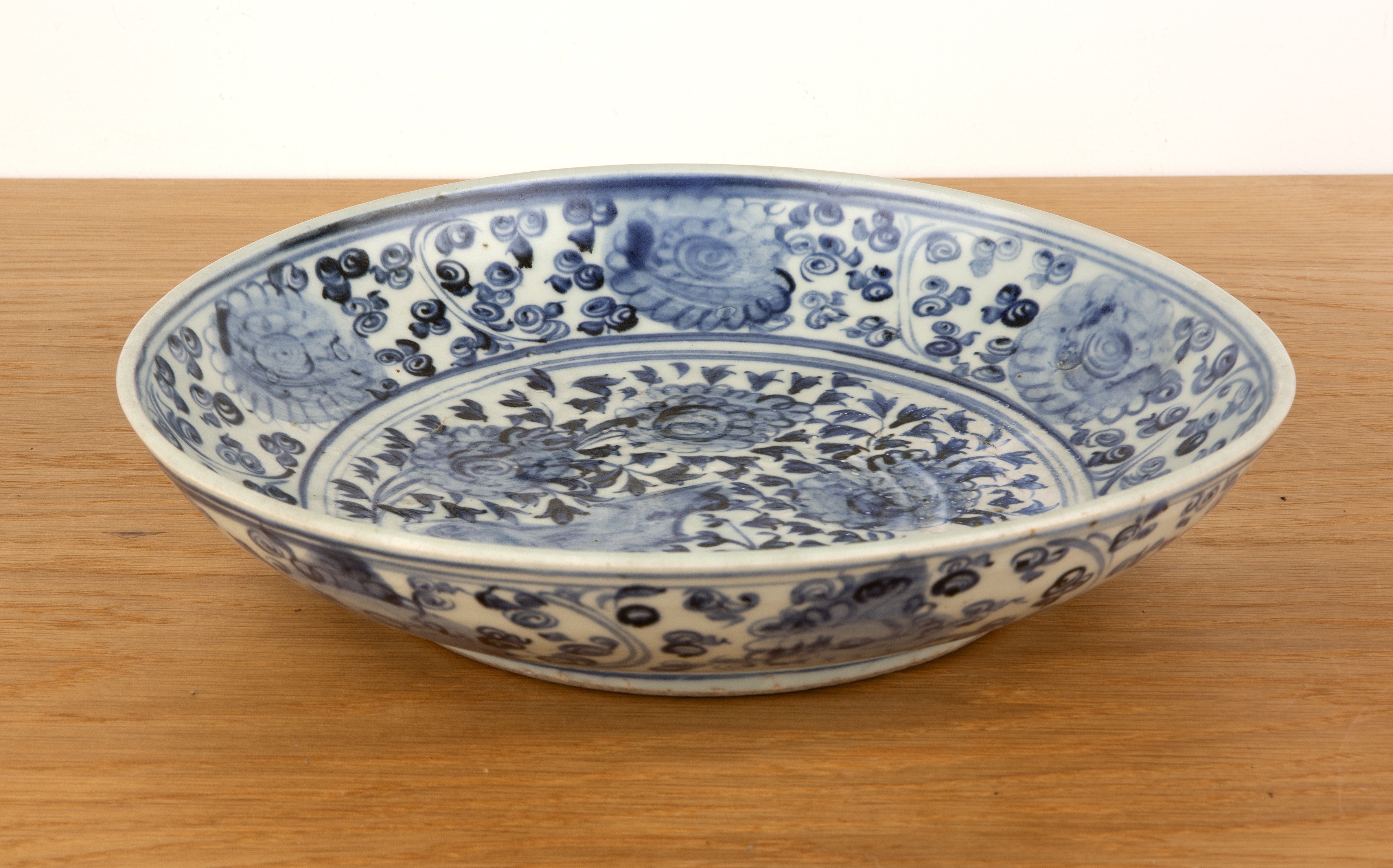 Blue and white porcelain dish Chinese, Ming Wanli period painted with rockwork and flowers, 30.7cm - Image 2 of 5