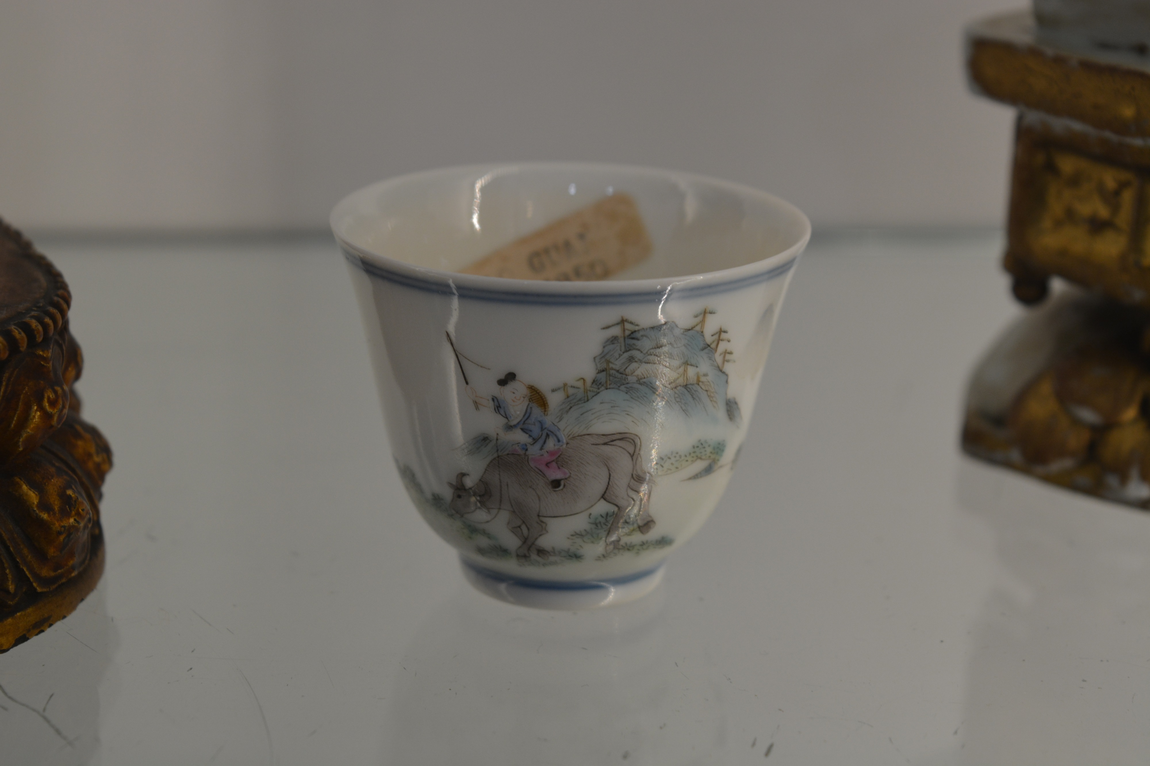 Doucai porcelain small tea bowl Chinese painted in enamels with a water buffalo being ridden by a - Image 6 of 15