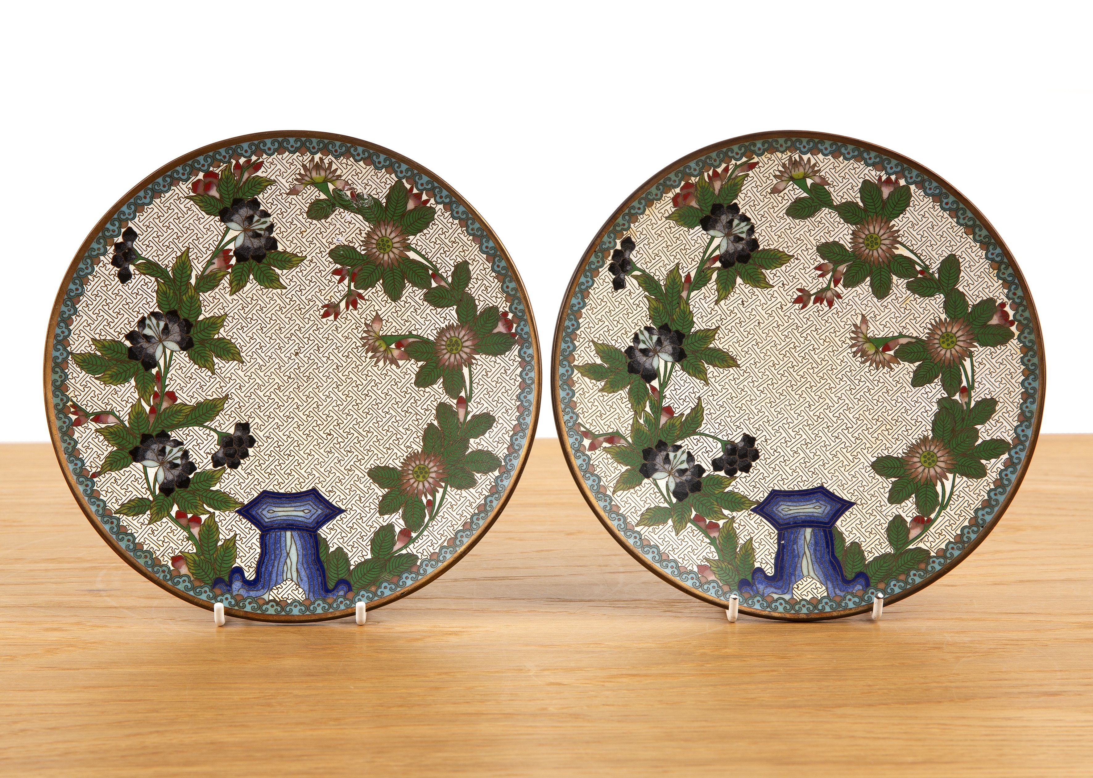 Pair of cloisonne marked dishes Chinese, 19th / early 20th Century with flower and rock work designs