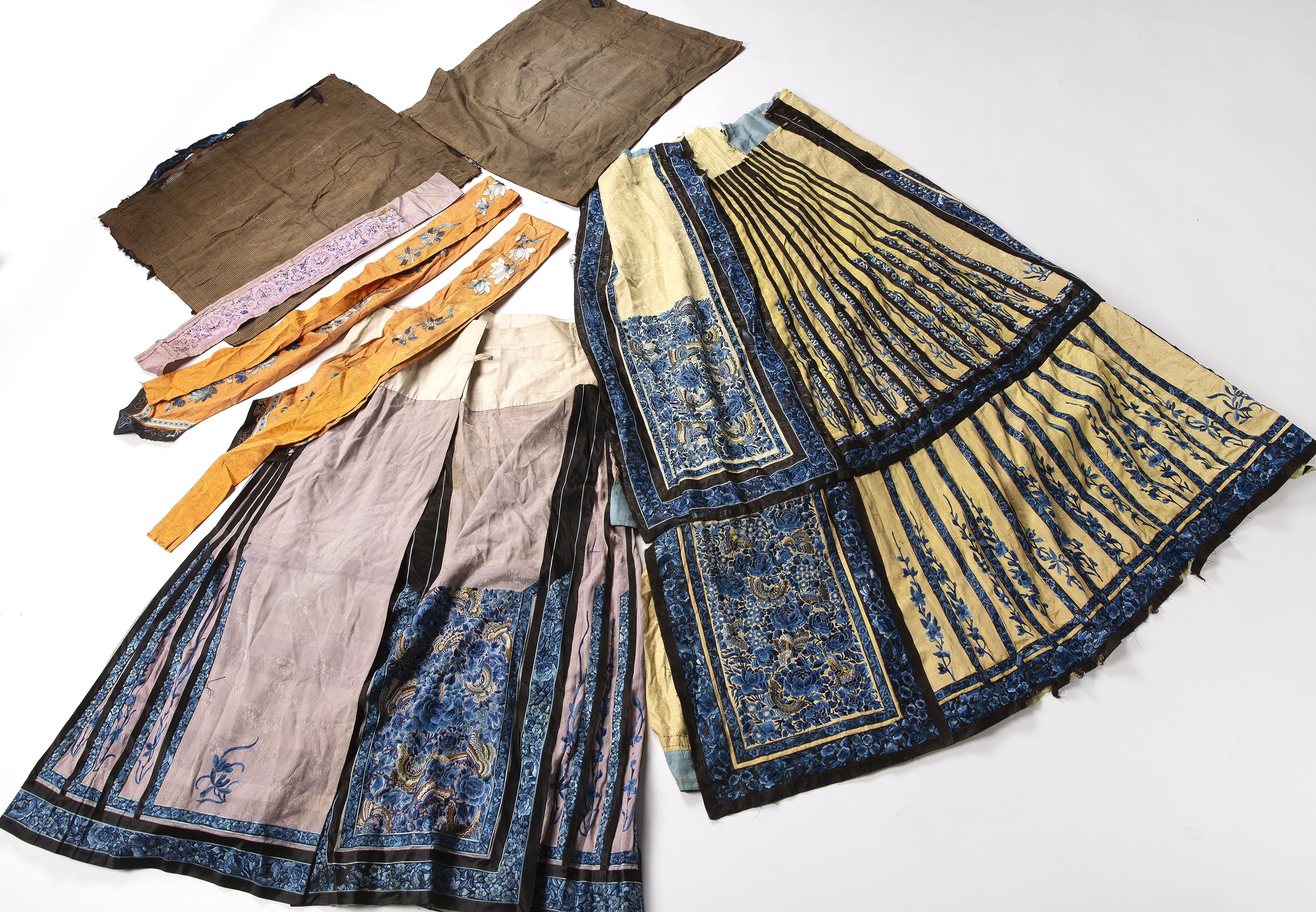 Collection of clothing and fabrics Chinese to include a pleated skirt, lilac ground and - Image 2 of 2